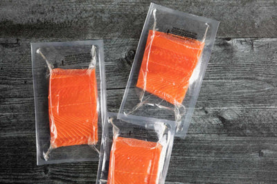 Kwee-Jack Fish Co. Wild Caught Alaskan Sockeye Salmon in vacuum seal pouches.